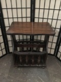 Vintage dark mahogany stained magazine rack side table with thick construction