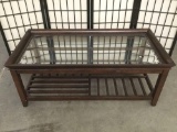 Modern glass top mahogany coffee table with slatted bottom tier - matches next lot