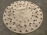 Round natural OPALHOUSE wool outdoor patio rug w/ cut out circular design