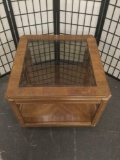 Vintage glass top coffee table, shows wear.