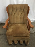 Vintage upholstered wooden rocking chair