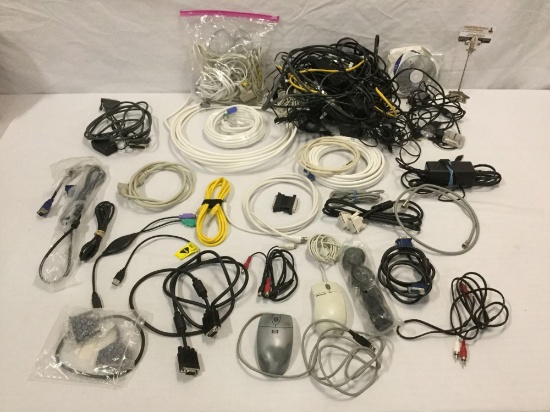 Huge collection of cords, cables, computer connections, mouses, & more.