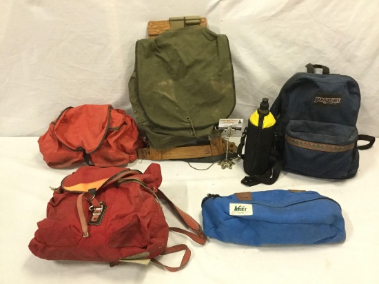 Collection of vintage camping gear incl. REI hip bag, framed backpack and more
