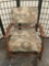 Wood carved rocking chair w/ geographical map design upholstered seat & back