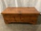 Vintage wood chest with metal details, approximately 33 x 17 x 13 inches