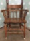 Vintage oak captains chair w/ doweled construction, nice finish.