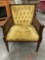 Vintage wood arm chair w/ woven wicker sides, upholstered seat/ back, shows wear