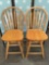 Pair of vintage oak swivel kitchen chairs, solid construction.