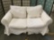 Mitchell Gold white canvas upholstered loveseat couch (Taylorsville, NC), minor wear, see pics.