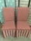 Pair of fully upholstered red and cream dining chairs