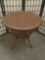 Modern round wicker side / patio table.