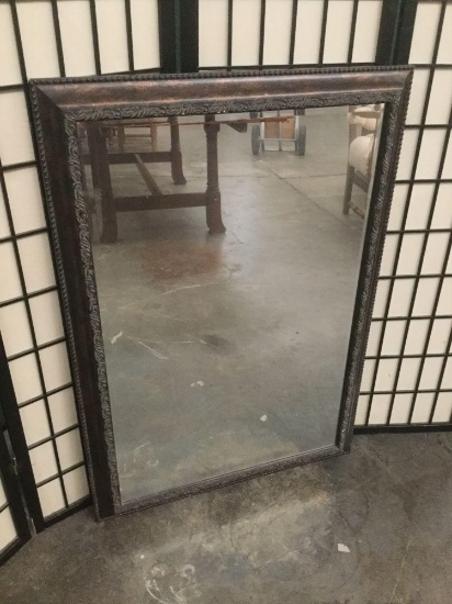 Modern wall hanging mirror, approximately 29 x 41 inches.