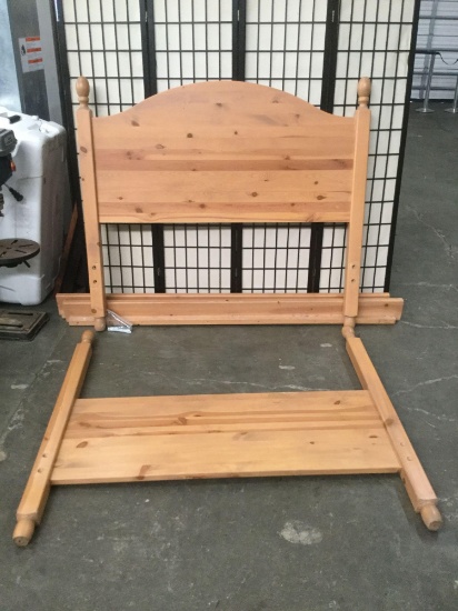 Full size oak bed frame with headboard and rails, approximately 57x52x76 in