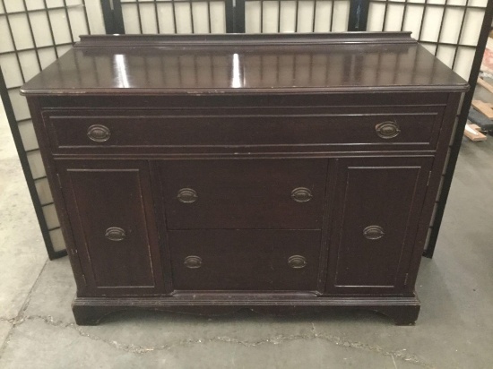 Vintage wooden buffet, shows surface wear, approximately 48x18x37 inches.