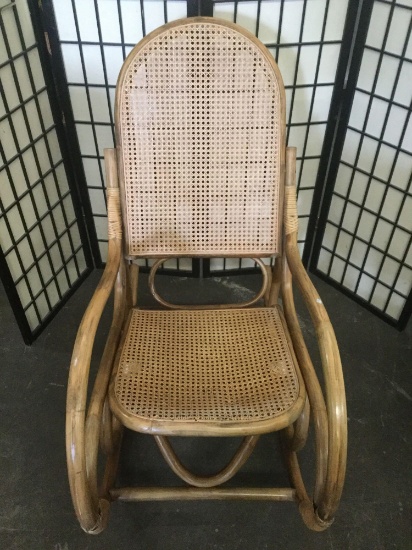 Vintage bamboo rocking chair w/ wicker seat and back, good condition.