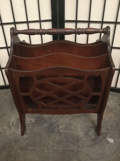 Vintage wood carved media rack with detailed wood cut design