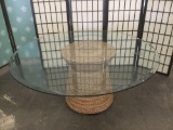 Round glass top coffee table w/ woven pedestal base, as is, see desc.