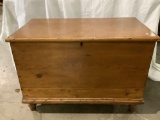 Vintage standing wood storage trunk with two metal handles