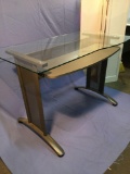 Modern steel frame, glass top computer desk with keyboard shelf, sold as is.