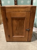 Antique wooden cabinet w/ interior shelves, approximately 22 x 15 x 29 inches.