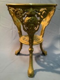 Ornate cast metal table base w/ intricate face design, no top, sold as is.