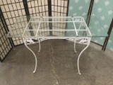 Vintage metal glass top patio table.