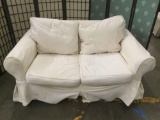 Mitchell Gold white canvas upholstered loveseat couch (Taylorsville, NC), minor wear, see pics.