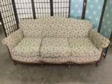 Vintage couch w/ floral upholstery & regal claw foot legs