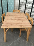 Laminate top bamboo table with 4 chairs. Table approx 49x37x29 inches.