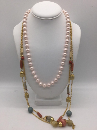 Pair of estate jewelry necklaces with plastic beads.