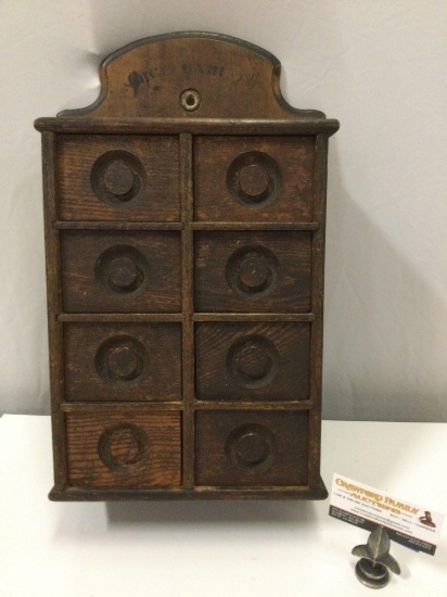 Antique wood spice cabinet with eight drawers, approximately 11 x 18 x 5 inches.