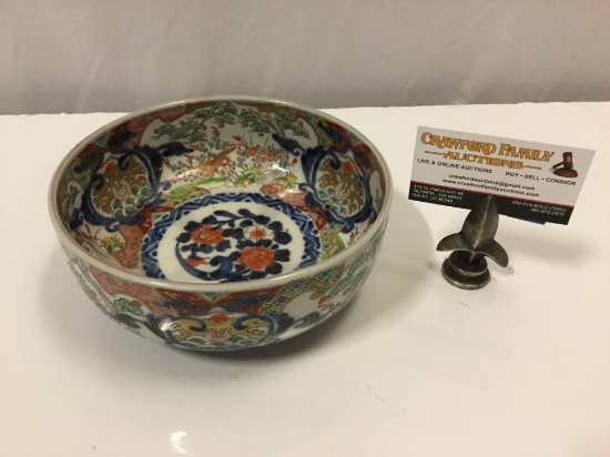 Vintage Asian porcelain bowl with vibrant decorative handpainted design, approx. 7.5 x 3 in.