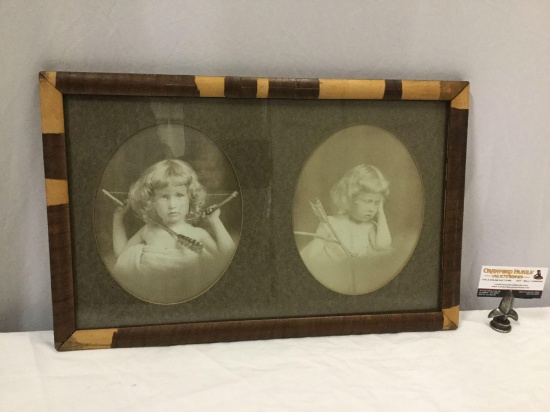 Antique picture frame w/ 2 photo portraits of a young girl as a cherub / angel, frame shows wear.
