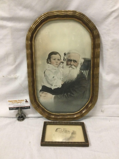 Pair of framed antique prints of a bearded man holding young child