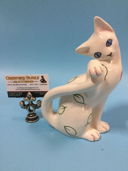 Vintage J.W. Co. porcelain hand painted cat figurine, made in Italy, approx. 6 x 8.5 inches.