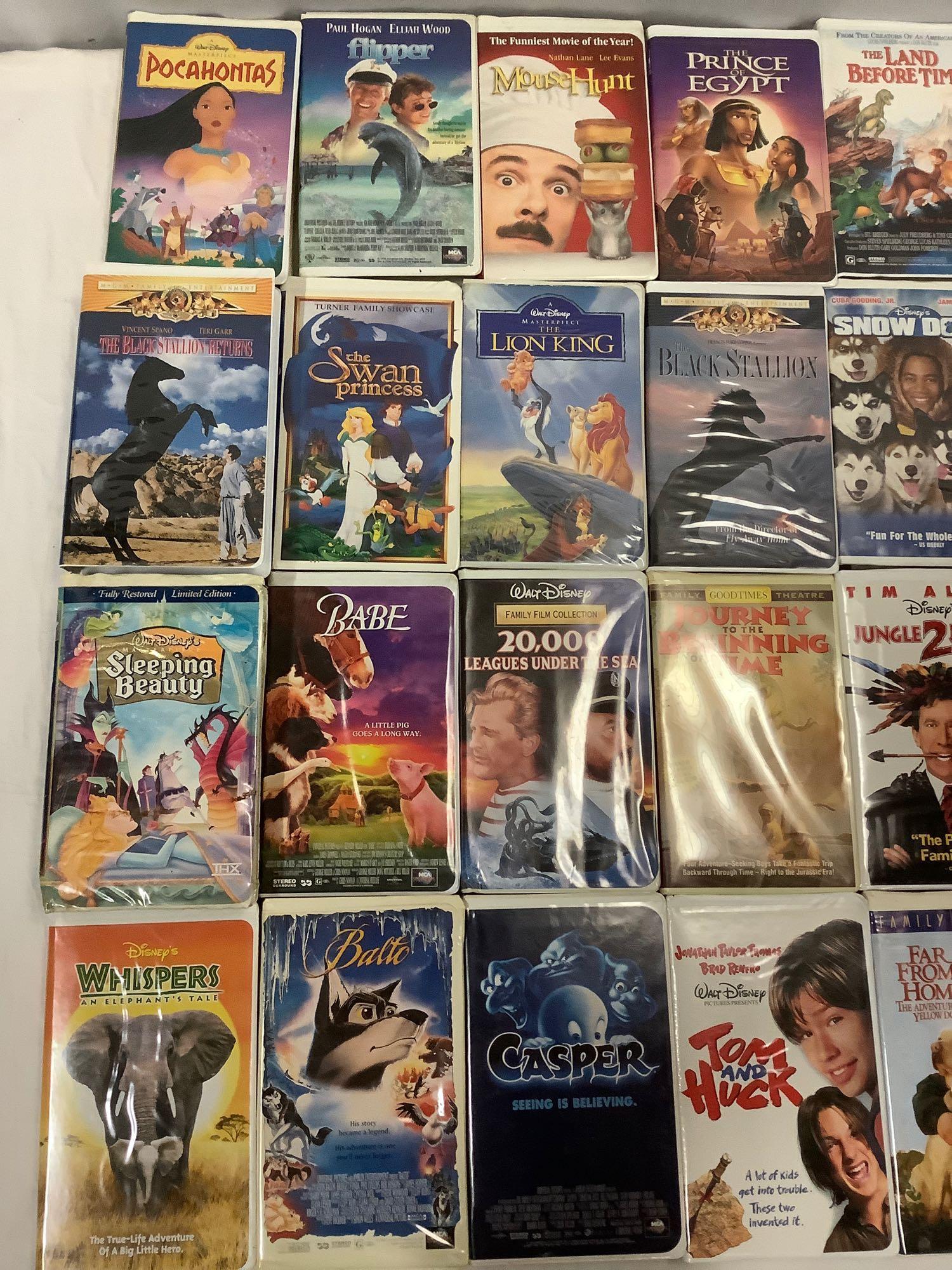 39 vintage VHS movies in clamshell cases; Walt | Proxibid