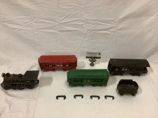 Antique cast iron locomotive train toy set; train cars marked: Washington, coal car marked: PRR w/