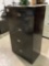 Black steel 4-drawer file cabinet, approx 30 x 18 x 53 in.