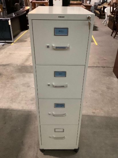 HON steel 4-drawer file locking cabinet w/ 2 keys, approx 15 x 22 x 51 in.