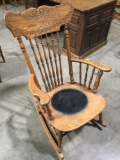 Vintage wood rocking chair with black leather upholstered seat, nice condition.