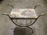 Vintage metal frame vanity seat with floral upholstery , approx 26 x 12 x 21 in.