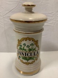 Vintage gold rim ceramic SANICULA kitchen jar with lid, approximately 6 x 12 in.