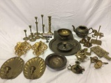 Vintage brass and gold tone home decor. Wall / table candle holders, cannon, carousel horse