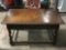 Vintage wood carved coffee table with drawer, approximately 34 x 17 x 20 in.