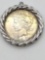 1922 silver peace dollar in a bezel / pendant