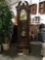 Howard Miller Clock Co. grandfather clock w/ pendulum, 3 weights, door key, clock key and 3 loose