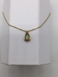 Gorgeous 14K gold women's 15 inch necklace and pendant featuring a brilliant tear drop opal 8.1 gram