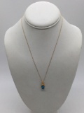 Beautiful 18 Inch 10K gold necklace with a 14K gold pendant featuring a 1plus ct Pear drop cut Topaz