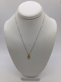 18 inch 14k gold women's necklace and pendant featuring an oval center cut diamond 2.2 grams