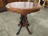 Vintage wood carved oval side table, approx 26 x 18 x 27 in. Nice condition.
